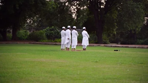 A group of Muslim man praying in the park outdoor: New Delhi, India - 10 11 2023 Video stock 262610233