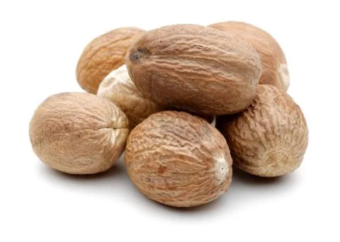Group of nutmeg on white background Stock Photos