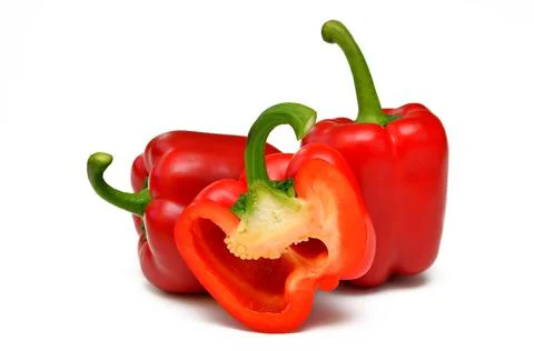 Group of objects whole paprika and pepper in a cut on a white background Stock Photos