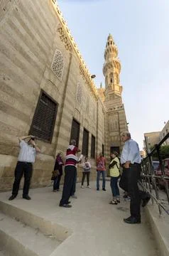 Group observes historical mosque in Cairo, Egypt Stock Photos
