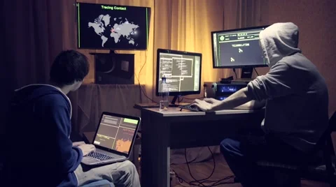 Group od hacker using computer code Stock Footage 60605652