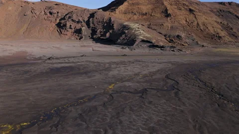 Group of offroad ATVs exploring remote rocky valley Stock Footage 319274869