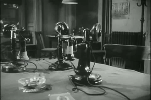 Group of old-fashioned telephones on table Stock-Footage 11346830