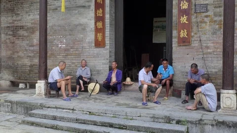 Group Of Old Friends Senior Men Relaxing In Chinese Village Stock Footage 80673140