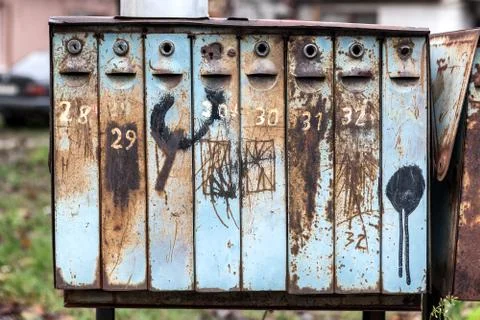 Group of old metal mail boxes. Stock Photos