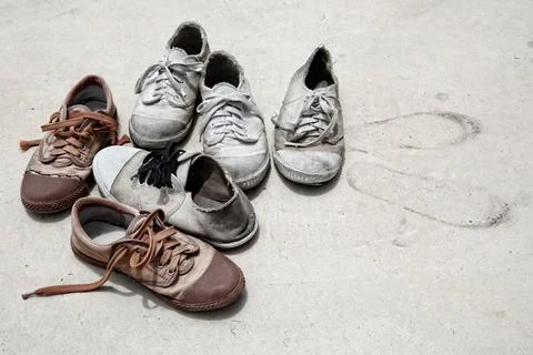 Group of old shoes Stock Photos