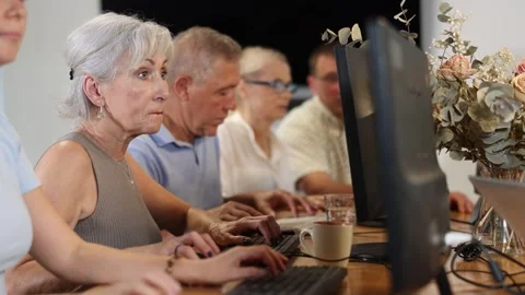 Group of older people studying on computer course Stock Footage 315029855