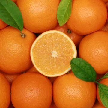 Group of oranges with leaves Stock Photos