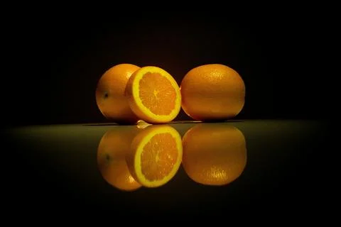 A group of oranges on a table Stock Photos