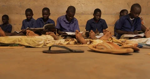 A group of orphans study at night in Mbale Uganda Stock Footage 109494077