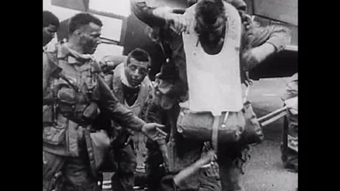 A group of para-troopers load planes and take off to commence D-Day during the Video stock 101703486