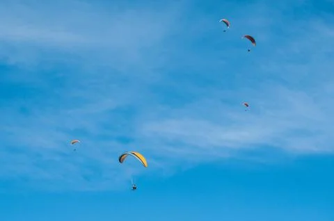 Group of paragliders on the sky Stock Photos