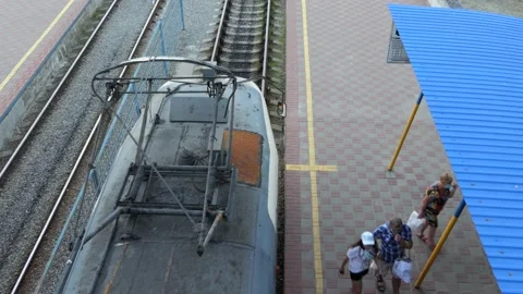 A group of passengers with children - violators of traffic rules for trams. Stock Footage 134965390