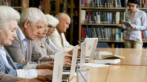 Group of Pensioners Having Computer Class Stock Footage 99257970