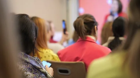 Group of people are sitting in a classroom Stock Footage 299973804