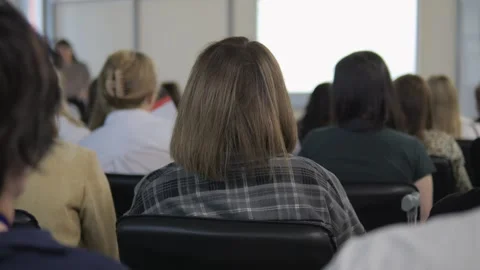Group of people are sitting in a classroom Stock Footage 314084846