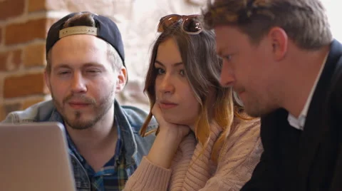 Group of people in the cafe at the table. People talk and drink coffee. Video stock 66950559