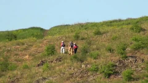 The group of people climbing the mountain in central Europe Stock Footage