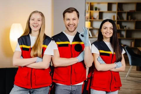 Group of people with cpr dummy looking at camera and smiling after first ai.. Stock Photos