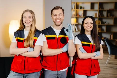 Group of people with cpr dummy looking at camera and smiling after first ai.. Stock Photos