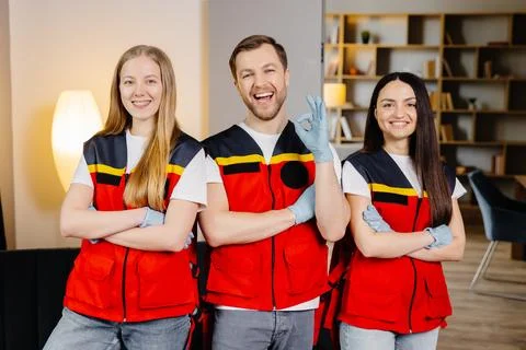 Group of people with cpr dummy looking at camera and smiling after first ai.. Stock Photos