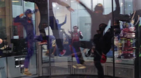 Group of people dance in fly station. Simulator skydiving. Contest. Competition Stock Footage 67558145