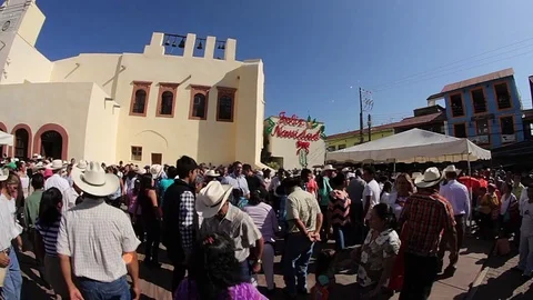 Group of people dancing in the public square of the town of Xilitla. Stock Footage 69773672