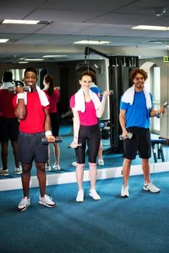 Group of people doing biceps exercise Fotos Stock