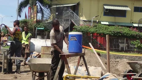 Group of people doing road works in Asia  Papua New Guinea Stock Footage 136161344