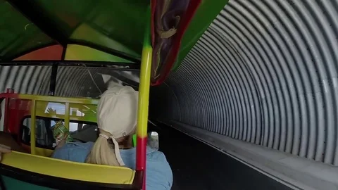 Group of people is driving to the beach through the tunnel on st kitts island 스톡 동영상 84181657
