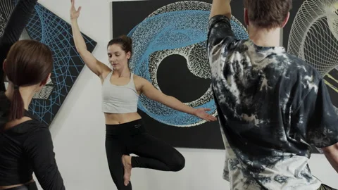 Group of people during balance training in the room with black and blue Stock Footage 157185049