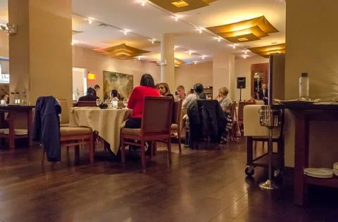 Group of People Eating &amp; Preparing to Ceebrate New Year in an Indian Restaurant 写真素材
