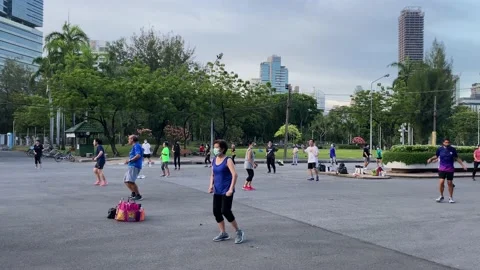 Group of people exercise dancing in the Lumphini Park, Bangkok, Thailand 4K Stock Footage 172401899