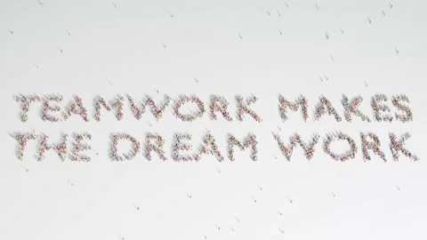 Group Of People Forming TEAMWORK MAKES THE DREAM WORK Animation on White 스톡 동영상 236695707