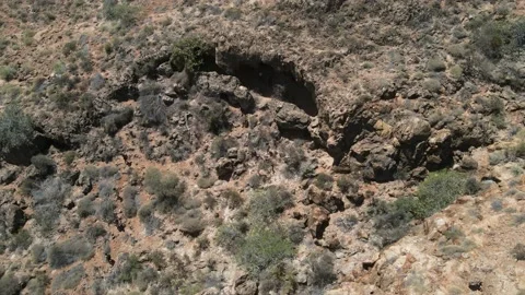 Group of people going out from cave in Australian desert 4K timelapse Stock Footage 152542369