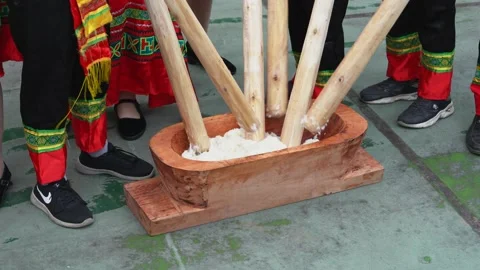 A group of people hammering glutinous ri... | Stock Video | Pond5