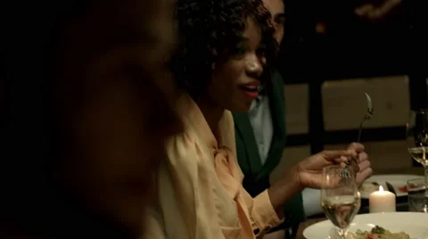 Group of people having dinner at a restaurant. Stock Footage 61157651