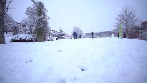 Group Of People   Having Fun Play Snowballs Stock Footage 83293948