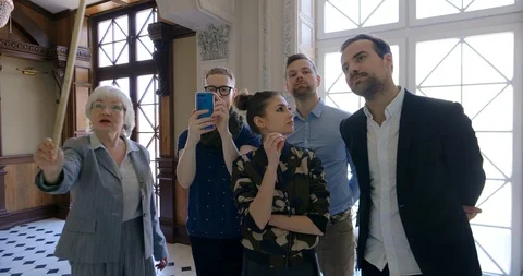 Group of people having museum guide tour Stock Footage 111709104