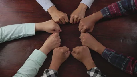 Group of people joining hands and representing concept of friendship, teamw.. 스톡 동영상 336932338
