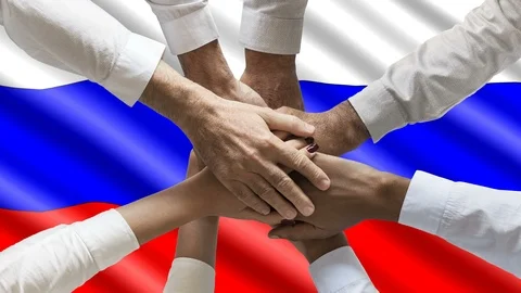 Group of people joining hands over waving russian flag animation loop Stock Footage 121927697