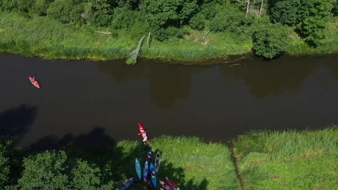 A group of people kayaking on the river Stock Footage 112621353