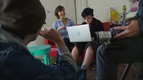 Group of people looking at a laptop Video stock 61676207