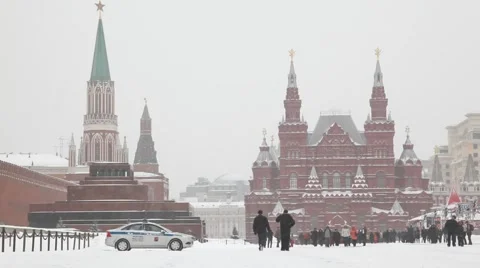 Group of people at Moscow Red Square under snowfall Stock Footage