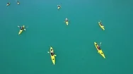 Group Of People Paddling On Kayak. Canoe Trip In Open Sea. Hd Aerial. Phuket Stock Footage