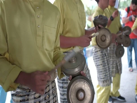 A group of people playing Cak Lempong in a wedding ceremony Видео 80150880