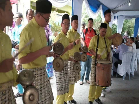 A group of people playing Cak Lempong in a wedding ceremony Видео 80150989