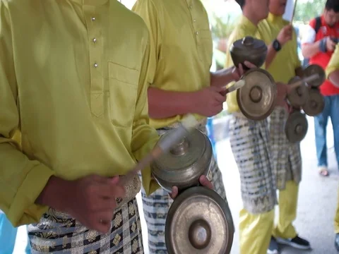 A group of people playing Cak Lempong in a wedding ceremony Видео 80151096