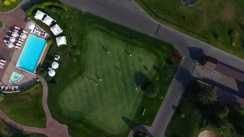 A group of people playing golf. Stock Footage 98642928