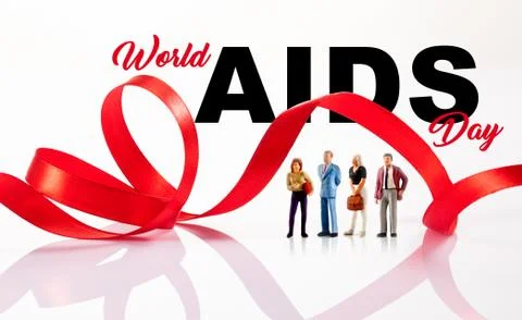 A group of people pose in front of a red ribbon to prevent against me AIDS 스톡 일러스트